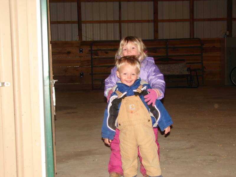Abby and Austin playing in the barn during one of the birthday parties